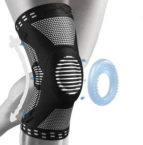 Black and grey knit compression knee sleeve with an open patella, a silicone patella ring and side stabiliser springs