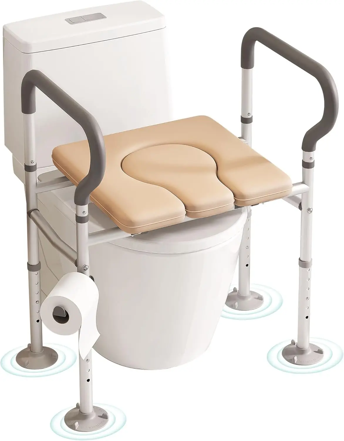 Padded beige raised toilet seat on an adjustable white frame with grey padded handles, suction feet and a paper holder
